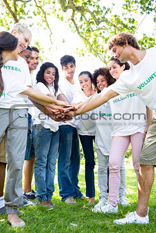 Environmentalists stacking hands