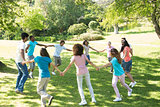 Friends walking in a circle at park