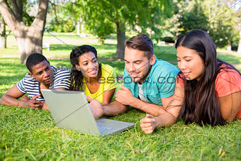 Students using laptop on campus