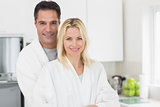Portrait of a smiling man and woman in the kitchen