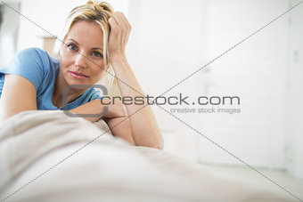 Portrait of a beautiful woman sitting in living room
