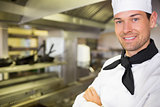 Closeup of a smiling male cook in kitchen