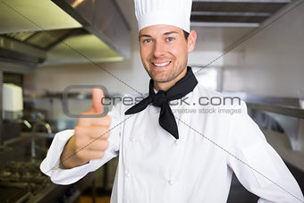 Portrait of a smiling male cook gesturing thumbs up