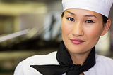 Closeup portrait of a smiling female cook