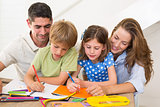 Family coloring together at home