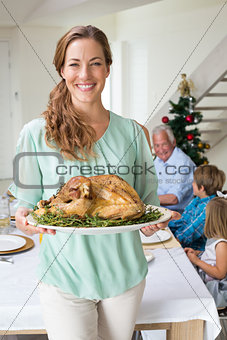 Happy mother with Christmas meal