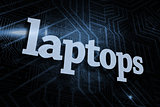 Laptops against futuristic black and blue background
