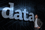 Data against futuristic black and blue background