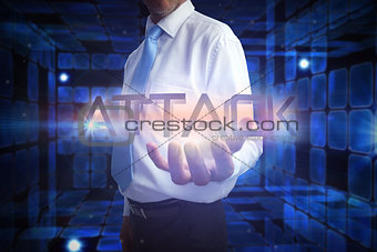 Businessman presenting the word attack