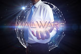 Businessman presenting the word malware