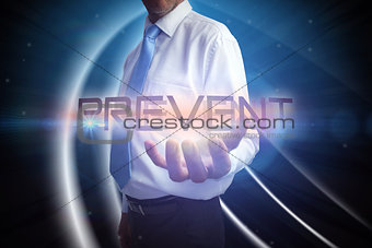 Businessman presenting the word prevent