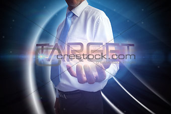 Businessman presenting the word target