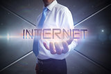 Businessman presenting the word internet