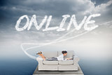 Online against cloudy sky over ocean