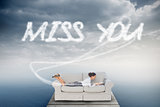 Miss you against cloudy sky over ocean