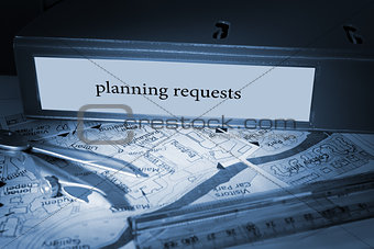 Planning requests on blue business binder