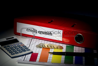Credit crunch on red business binder