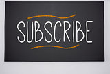 Subscribe written on big blackboard