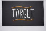 Target written on big blackboard