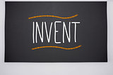 Invent written on big blackboard