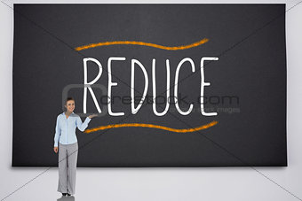 Businesswoman presenting the word reduce