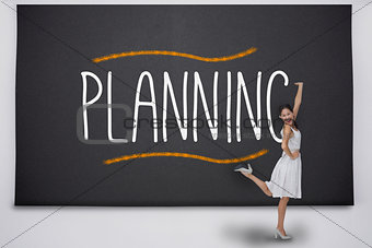 Pretty asian woman against the word planning