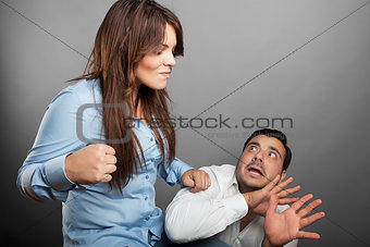 Girl threatens with a fist his boyfriend