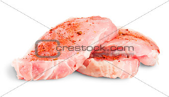 Heap Of Three Pieces Of Raw Pork With Spices