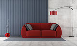 Contemporary living room with red couch