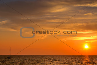 Ship sailing at dusk