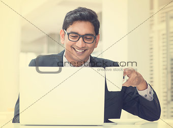 Vintage young Asian Indian businessman