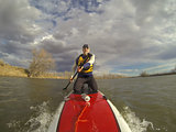 kneeling on stand up paddleboard