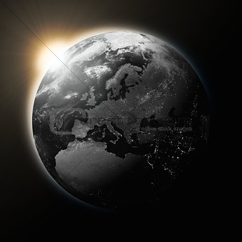 Sun over Europe on dark planet Earth