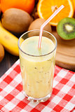 Glass of tropical fruit smoothie