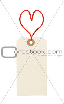 cardboard tag with red heart ribbon isolated on white background