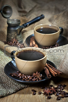 Two cups of coffee with spices