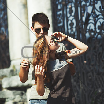 Teen couple bonding, posing together.