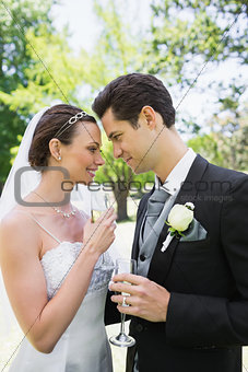 Romantic bride and groom in park