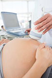 Expectant woman receiving ultrasound