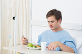 Patient having meal in hospital