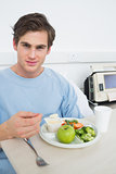 Patient eating healthy food in hospital