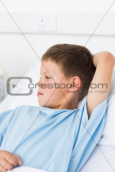 Boy with thermometer in mouth