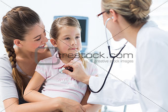 Girl being examined by female pediatrician