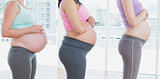 Pregnant women standing in a line