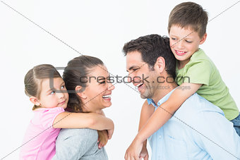 Cheerful young family posing