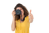 Female photographer gesturing thumbs up