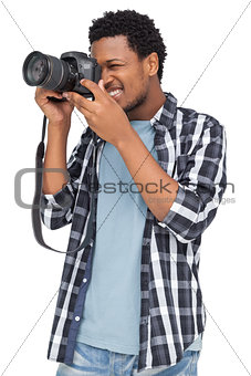 Young man with camera
