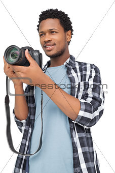 Young man with camera