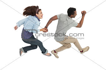 Side view of a cheerful couple jumping