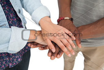 Mid section of a couple with hands together